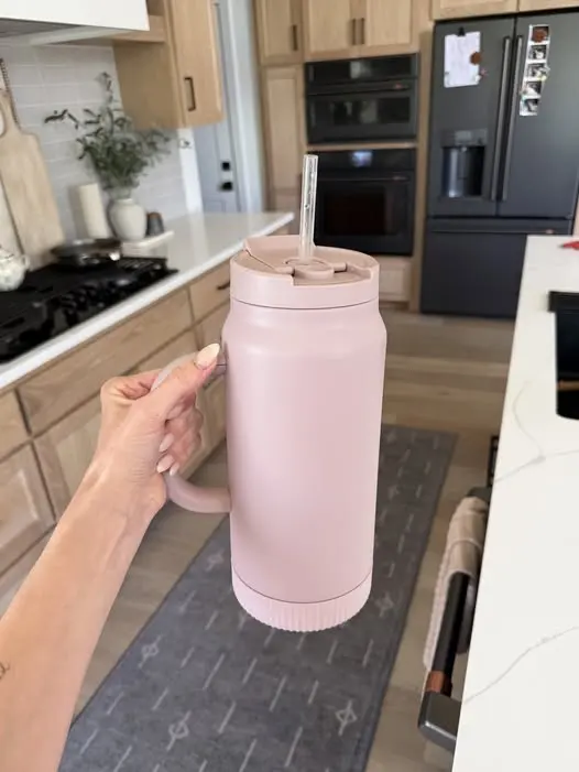 A HALF GALLON water jug that keeps your ice cold and keeps you hydrated — photo from Chloe Webb's Chloe's Closet post
