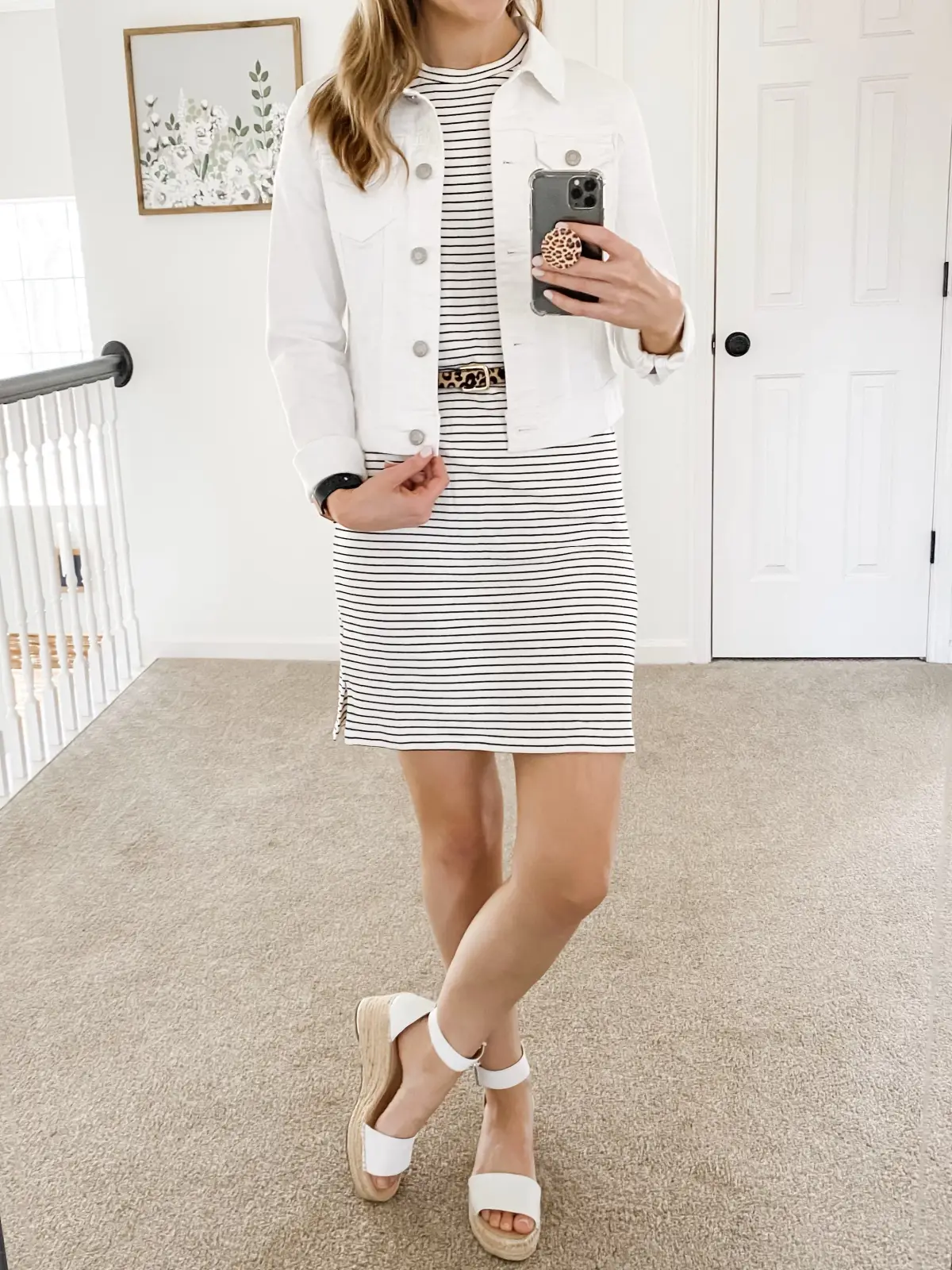 Striped dress HERE.White denim jacket (wearing a small) HERE.Leopard belt HERE.White wedges HERE. — 8 Easy Striped Dress Outfit Ideas